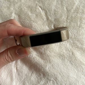 Fitbit Alta (small, gold wrist band) with charger